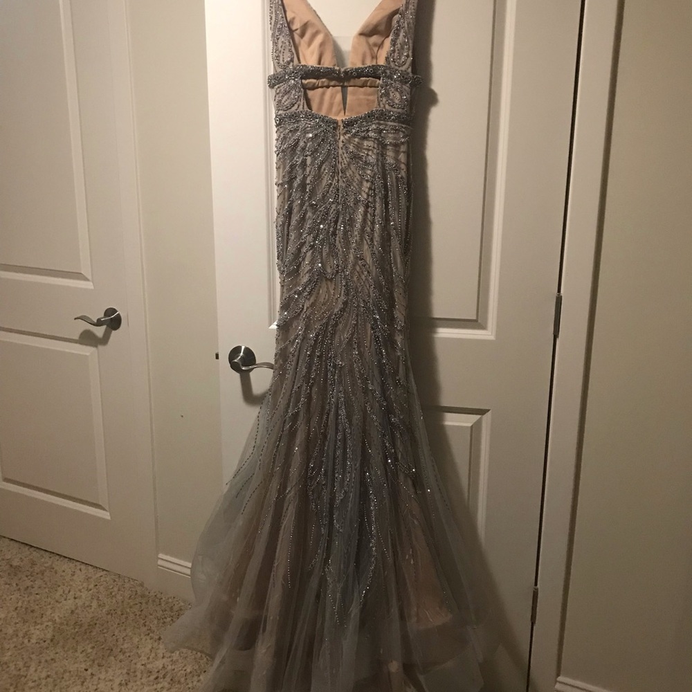 Beautifully beaded and an eye catching dress!